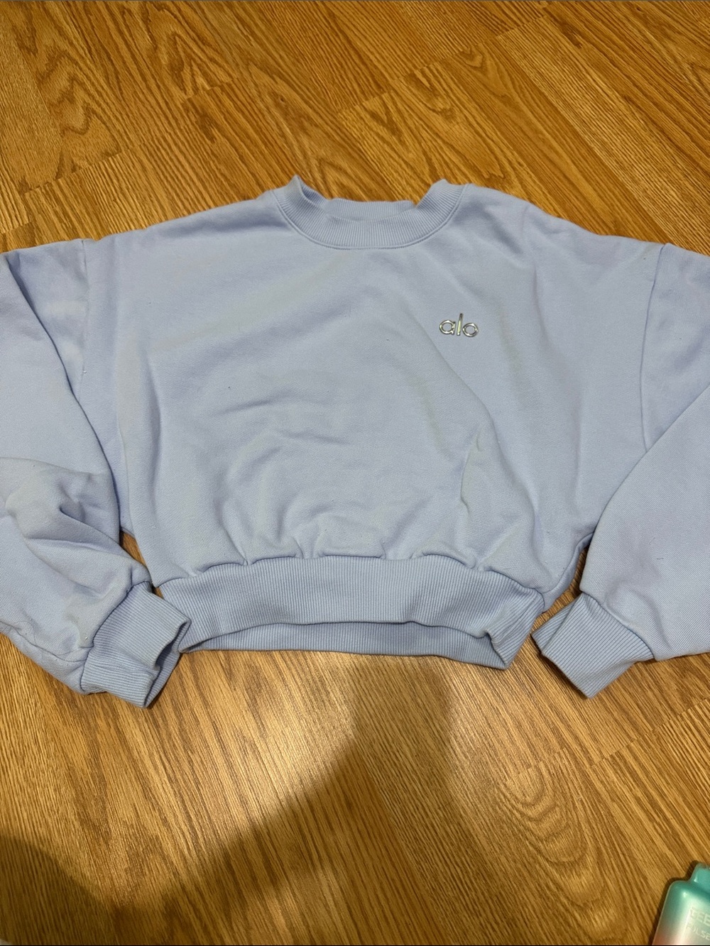 ALO Yoga Cropped Crew Neck Sweatshirt in Pale Blue